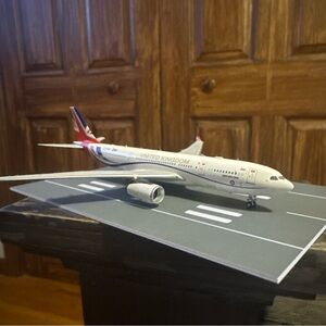 United Kingdom Model Airplane with Red and White Details